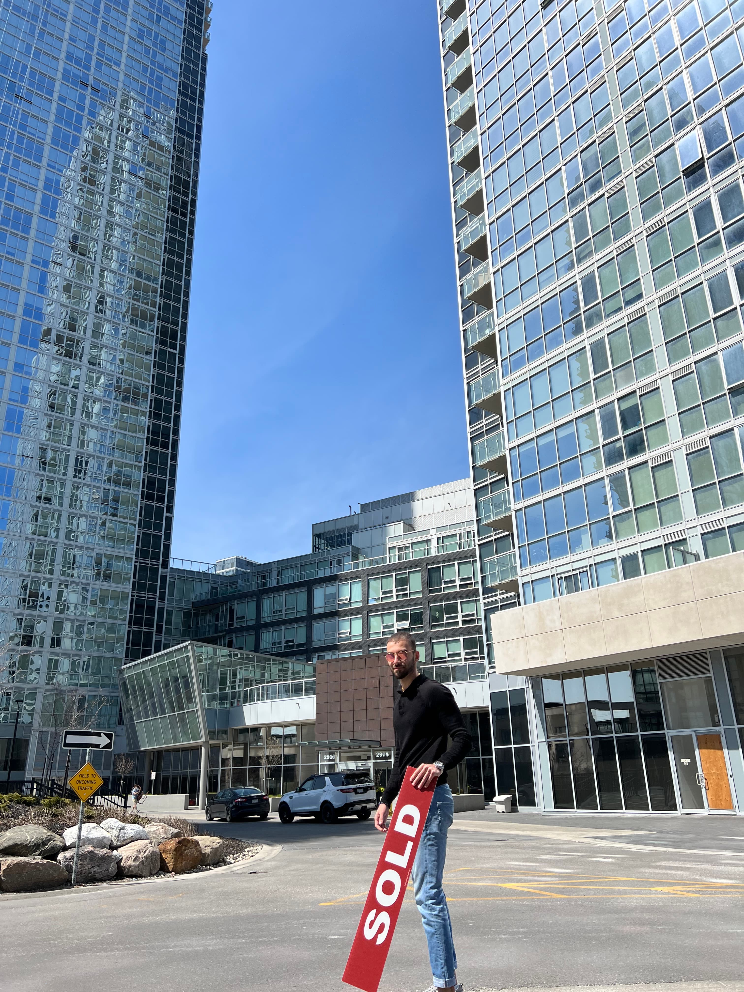 Sold closing downtown between glass towers