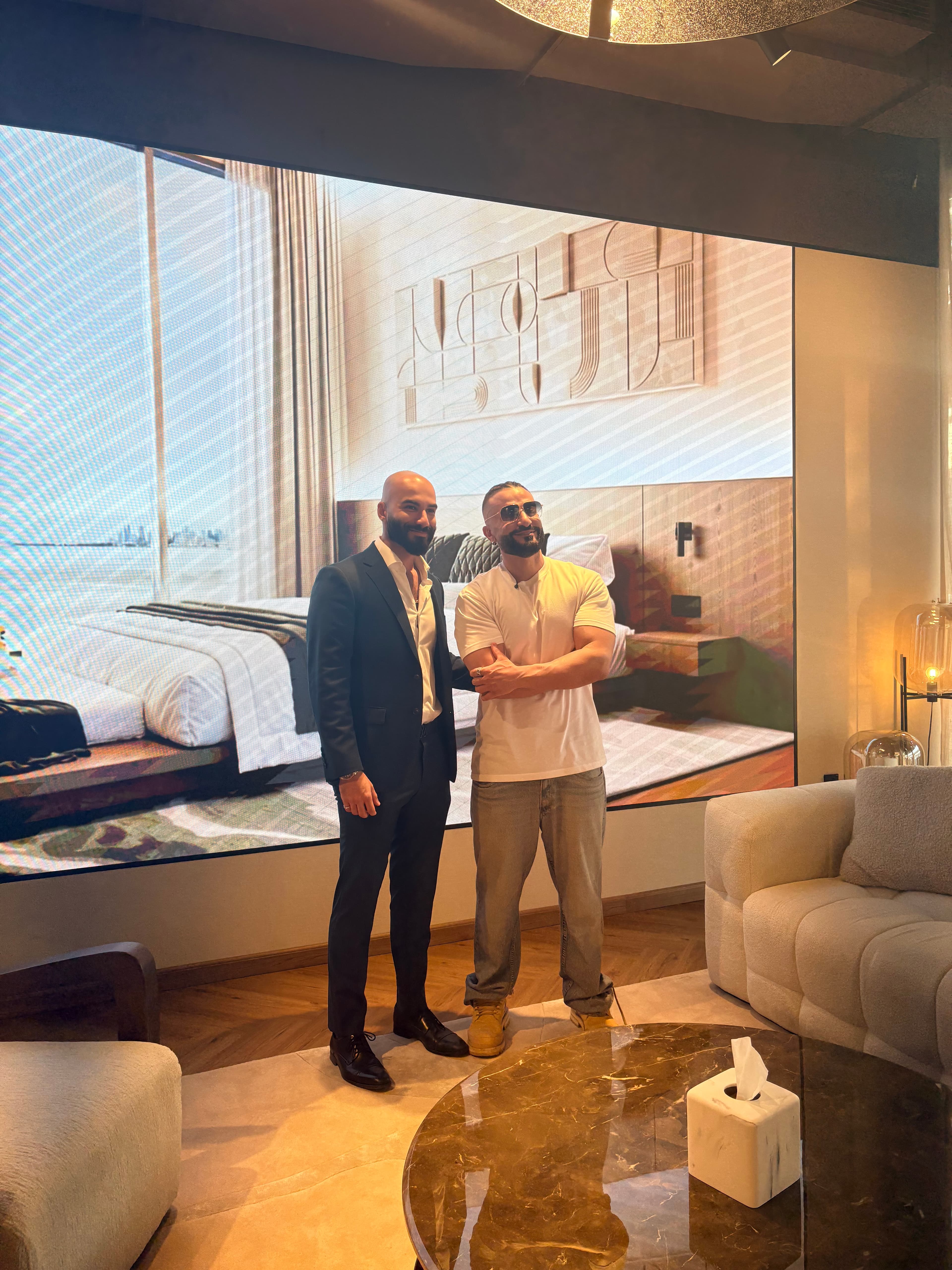 Navid Rashid with Kris at a luxury development sales centre